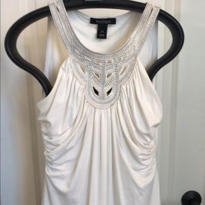 WHBM white sleeveless blouse.
